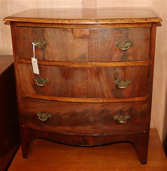 A small mahogany three drawer bow front chest W.66cm